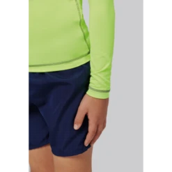 Camiseta Manga Larga Surf Con Proteccion UV Amarillo Niños -Tienda Al Aire Libre camiseta manga larga surf con proteccion uv amarillo ninos 1